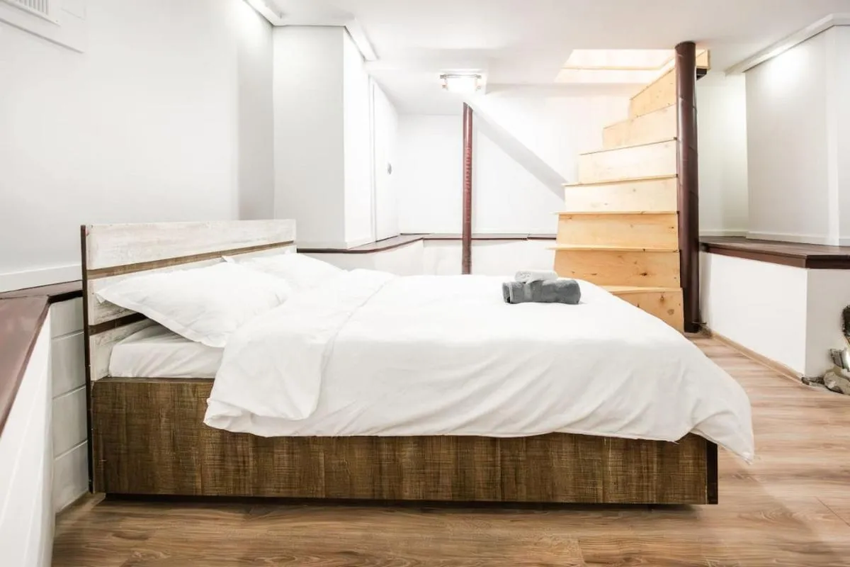Image 1 of Roman Relics and Modern Style – Unique 1BR Experience