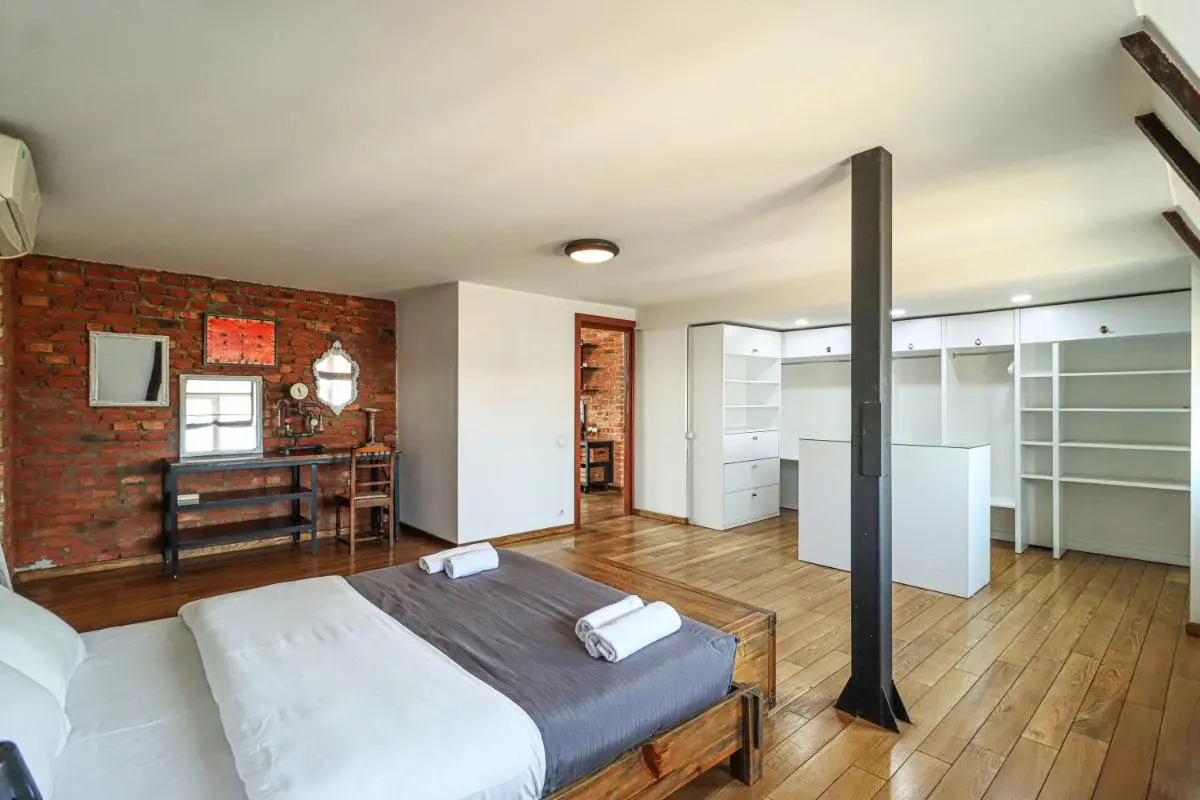 Image 3 of Vintage Mezzanine Apt in City Center – By Wehost